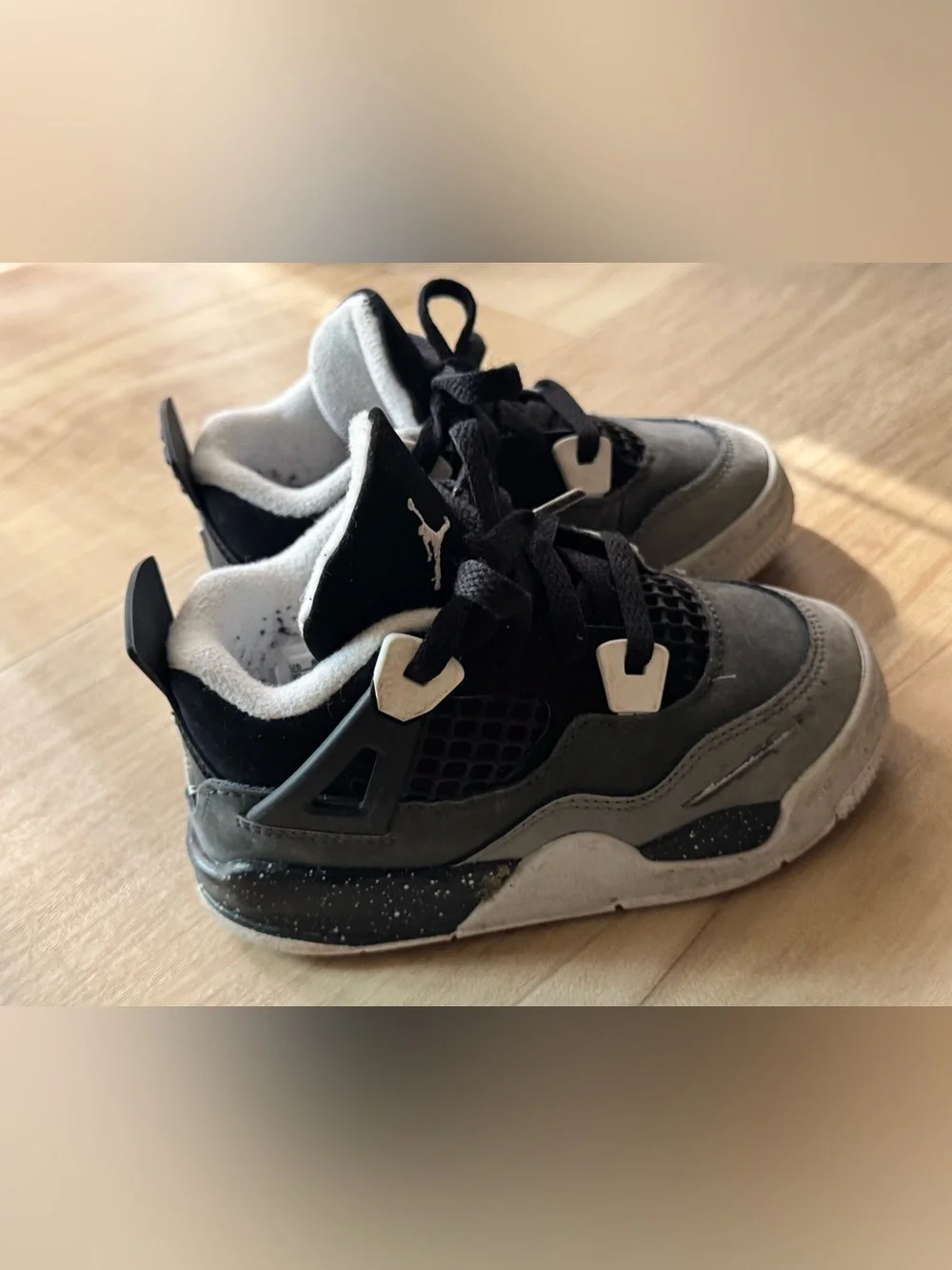Nike Jordan 4 retro Black and Gray Retro Sneaker 7.5C used